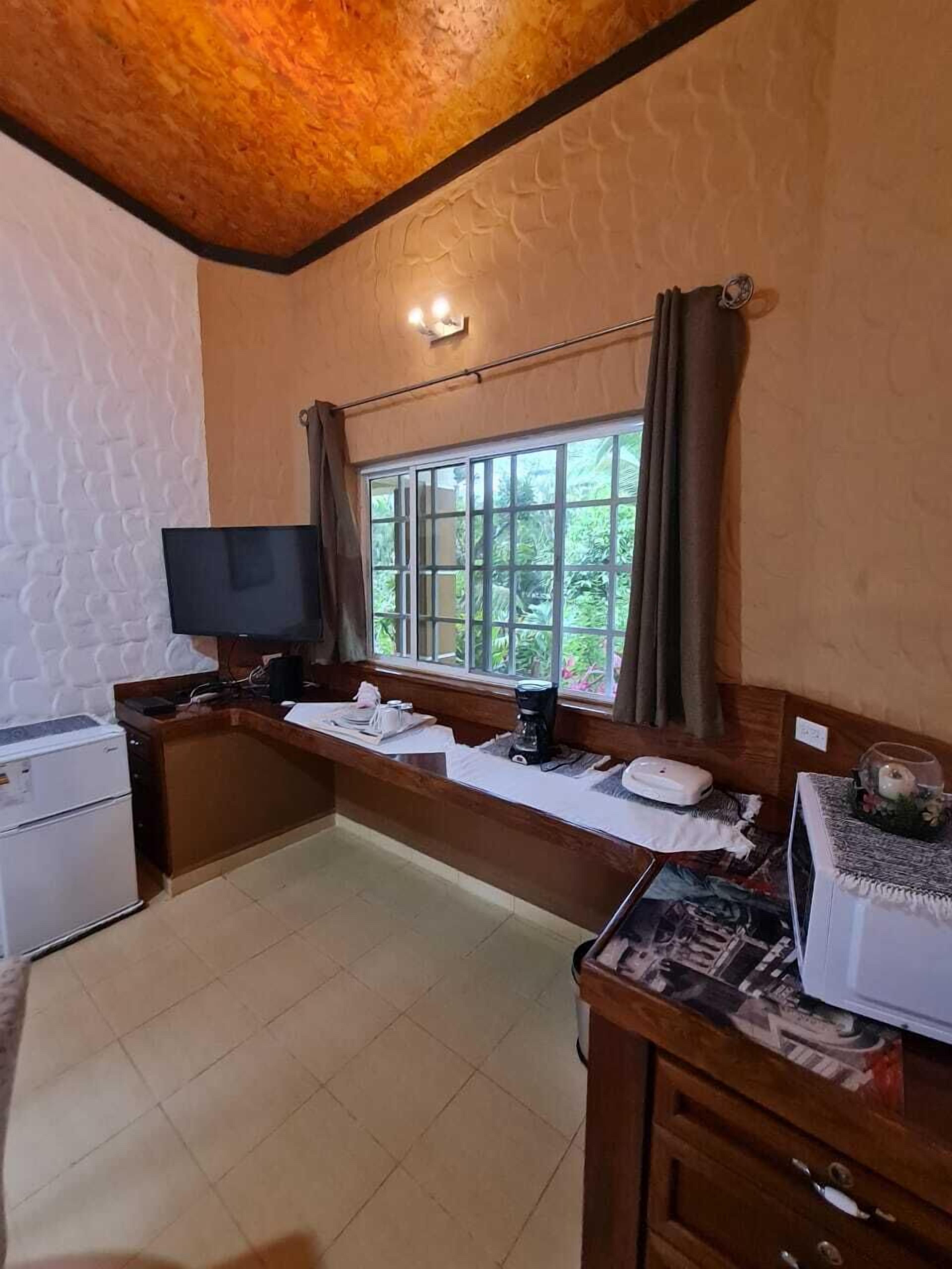 deluxe apartment | individually furnished, desk, laptop workspace, iron/ironing board