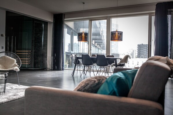 Exclusive Condo, Non Smoking | Living room | 42-inch flat-screen TV with cable channels, TV