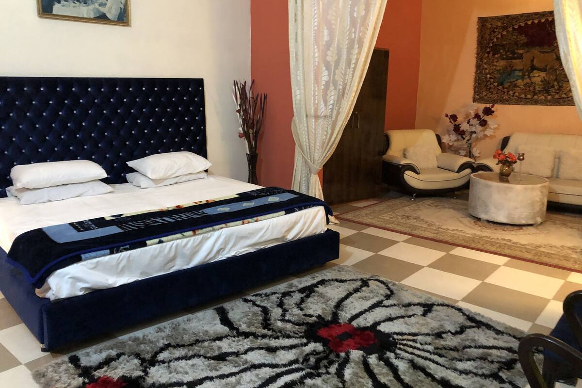 Luxury Suite, 1 Queen Bed, Garden View | Iron/ironing board (on request), WiFi (free), individually decorated