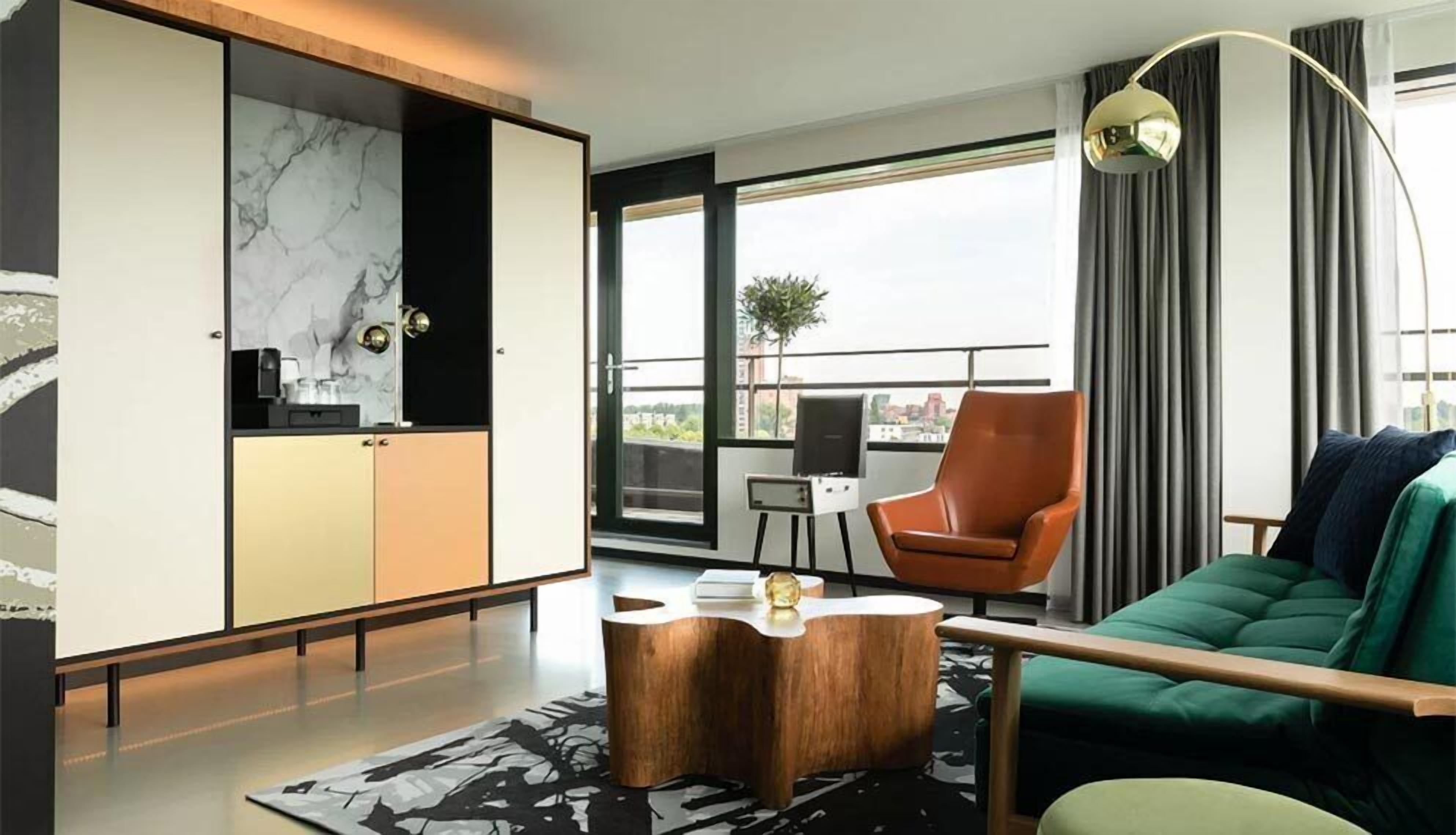 suite, balcony | 1 bedroom, in-room safe, desk, iron/ironing board