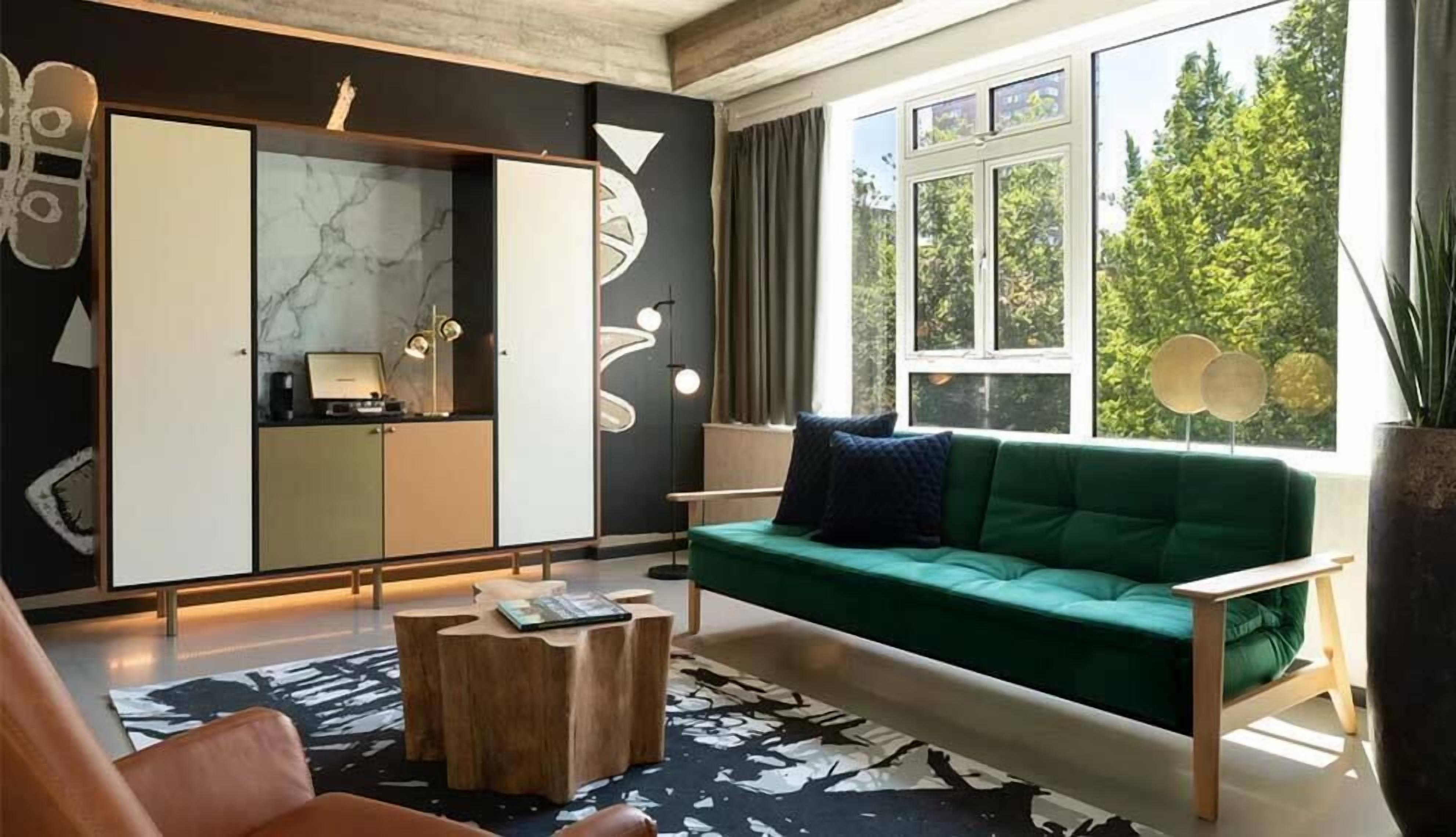 Suite, Balcony | In-room safe, desk, iron/ironing board, free WiFi