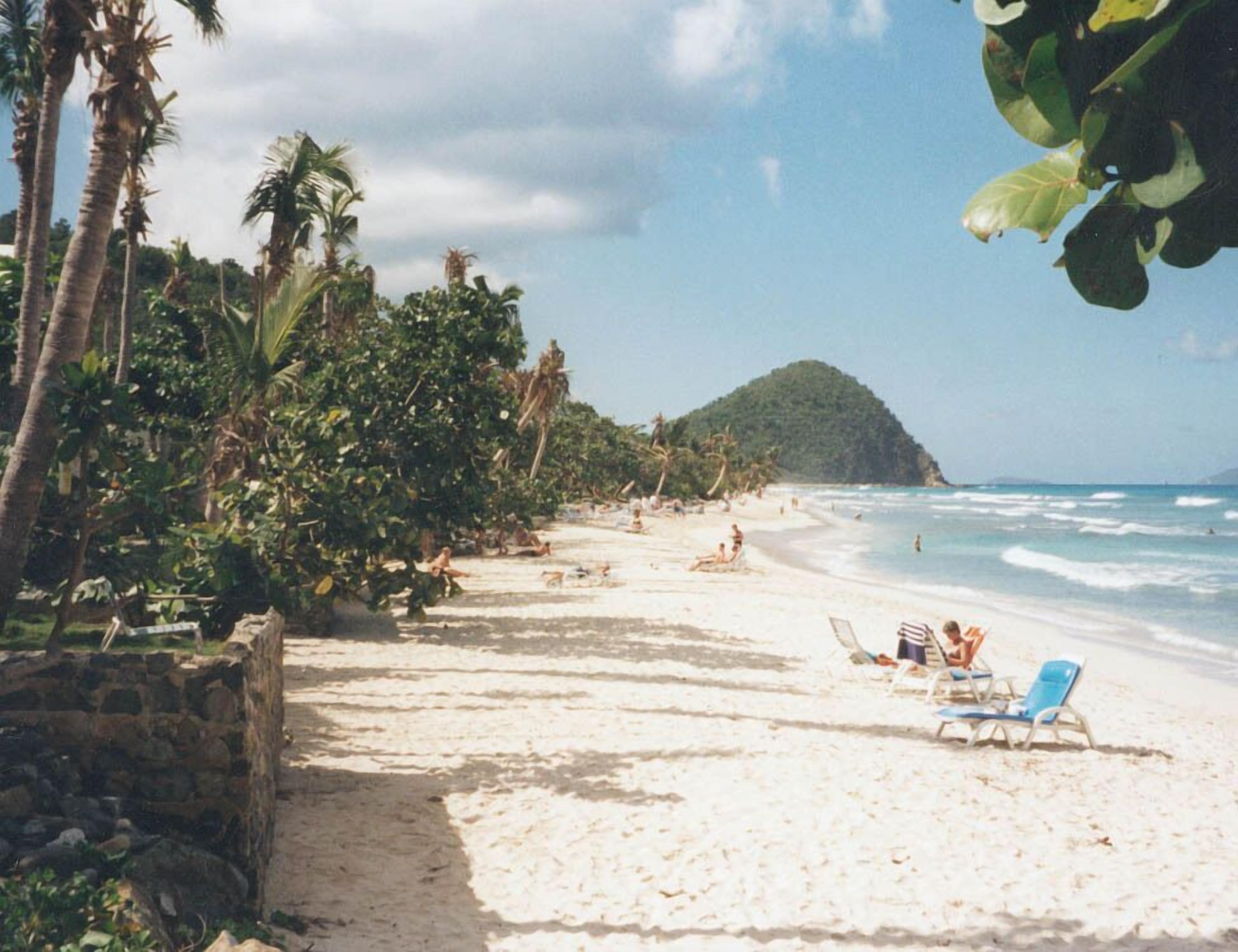 On the beach, sun loungers, beach towels