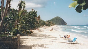 On the beach, sun loungers, beach towels
