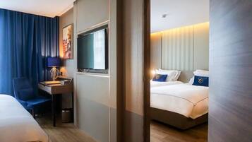 Family Connecting | In-room safe, desk, laptop workspace, blackout drapes