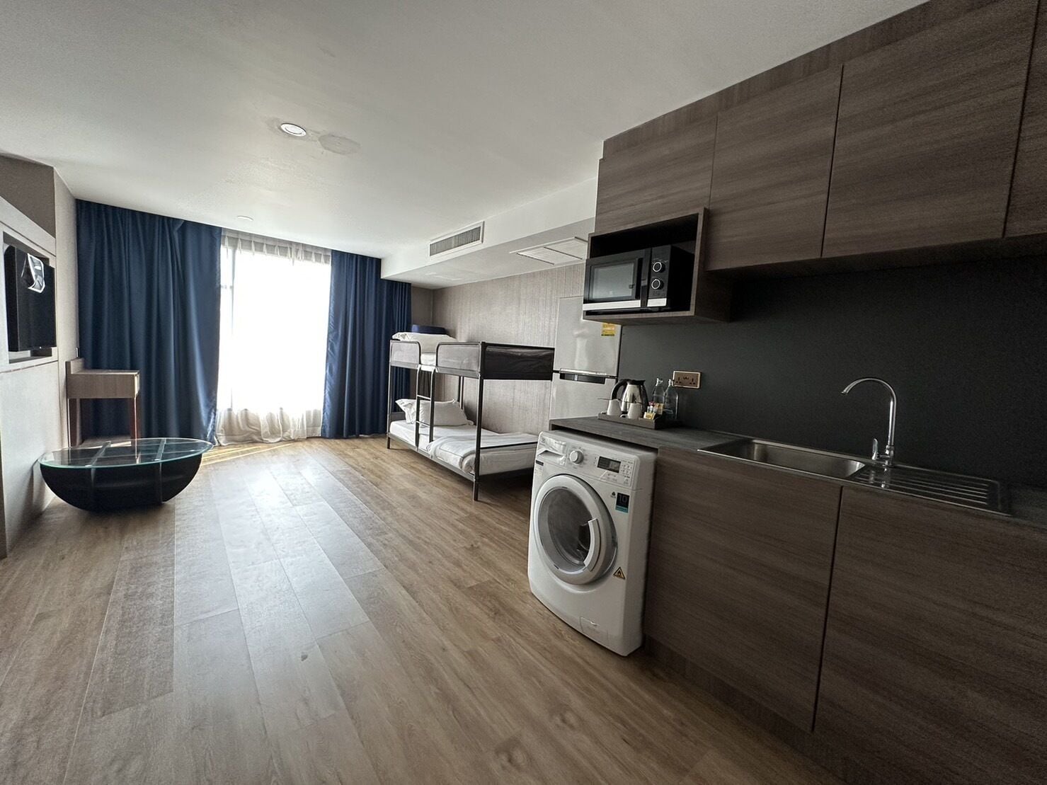 executive family suite | in-room safe, desk, laptop workspace, blackout curtains