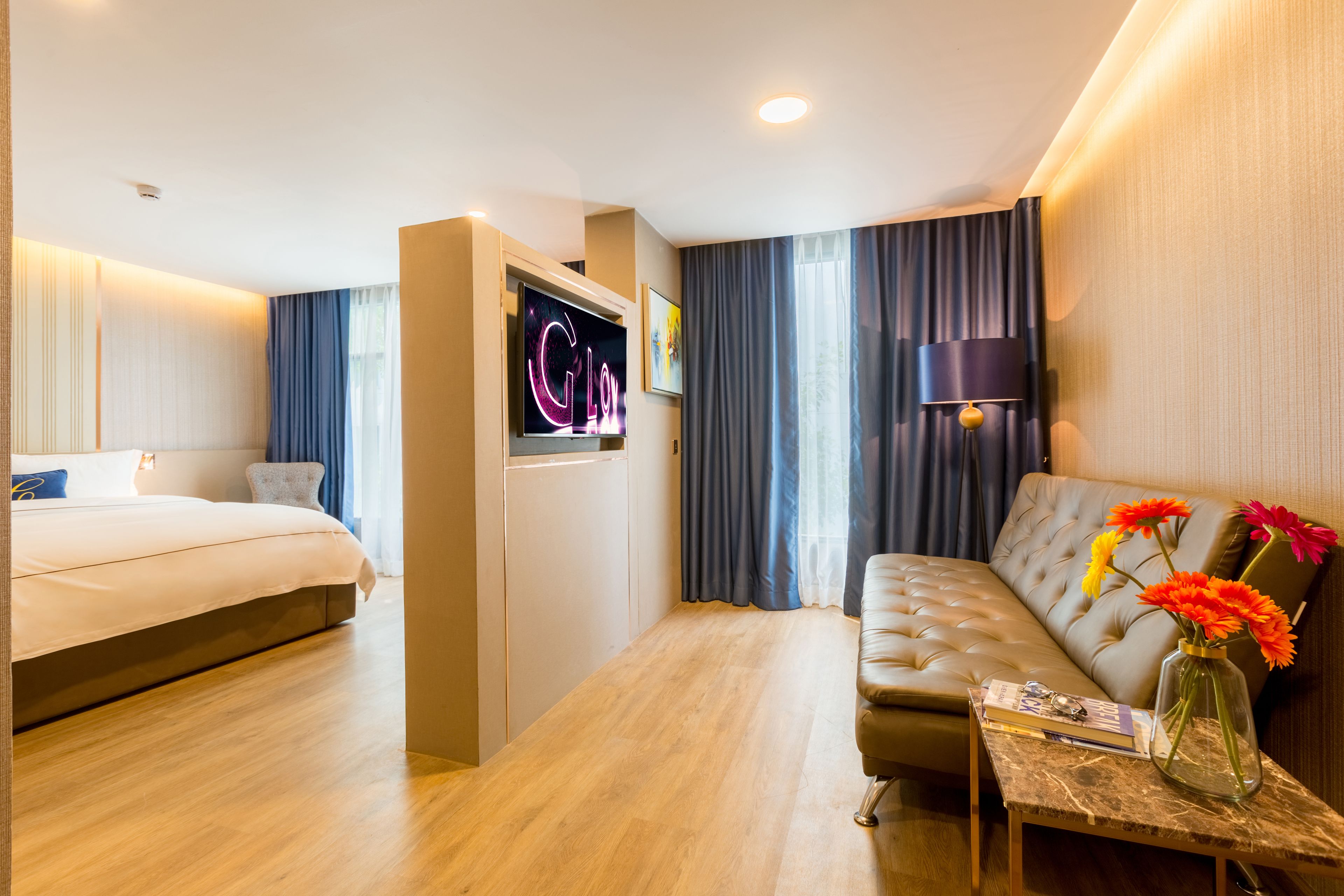premier suite | in-room safe, desk, laptop workspace, blackout curtains