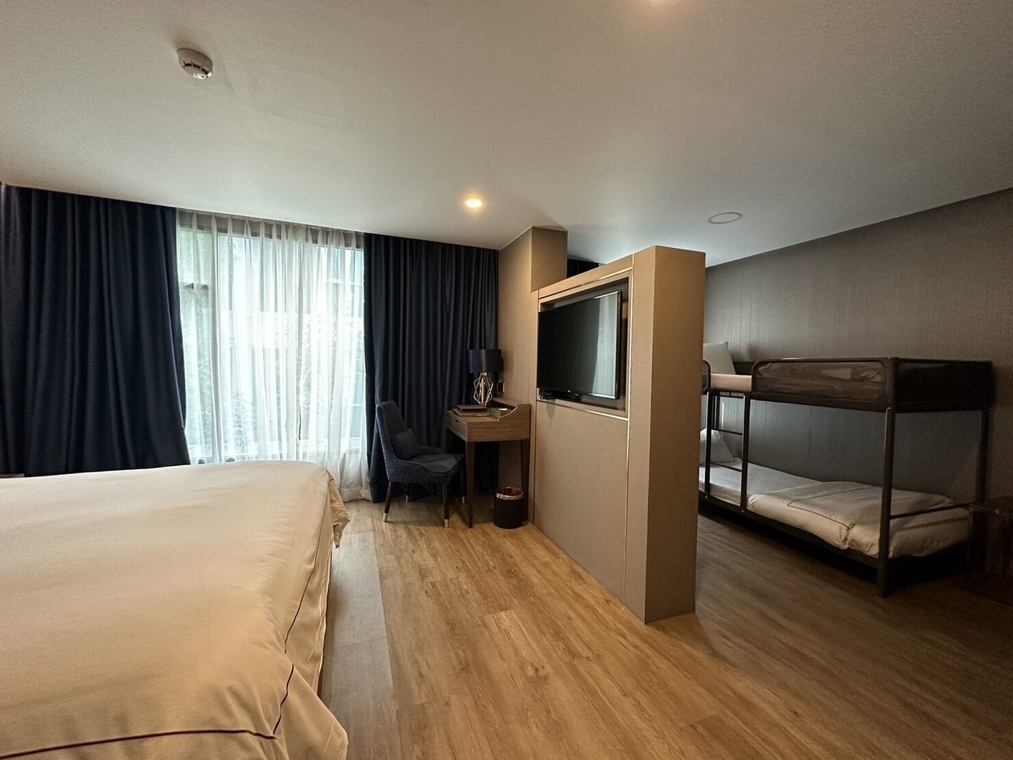 family suite | in-room safe, desk, laptop workspace, blackout curtains