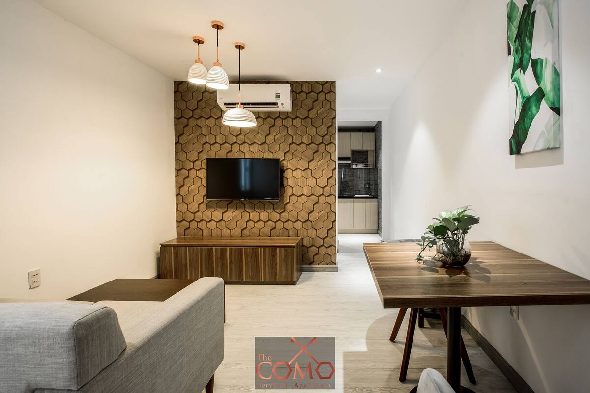 Apartamento superior | Sala de estar | Una televisión de pantalla plana