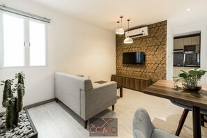 Superior-Apartment | Wohnzimmer | Flachbildfernseher