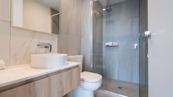 Deluxe Apartment, 2 Bedrooms | Bathroom | Shower, free toiletries, hair dryer, bathrobes