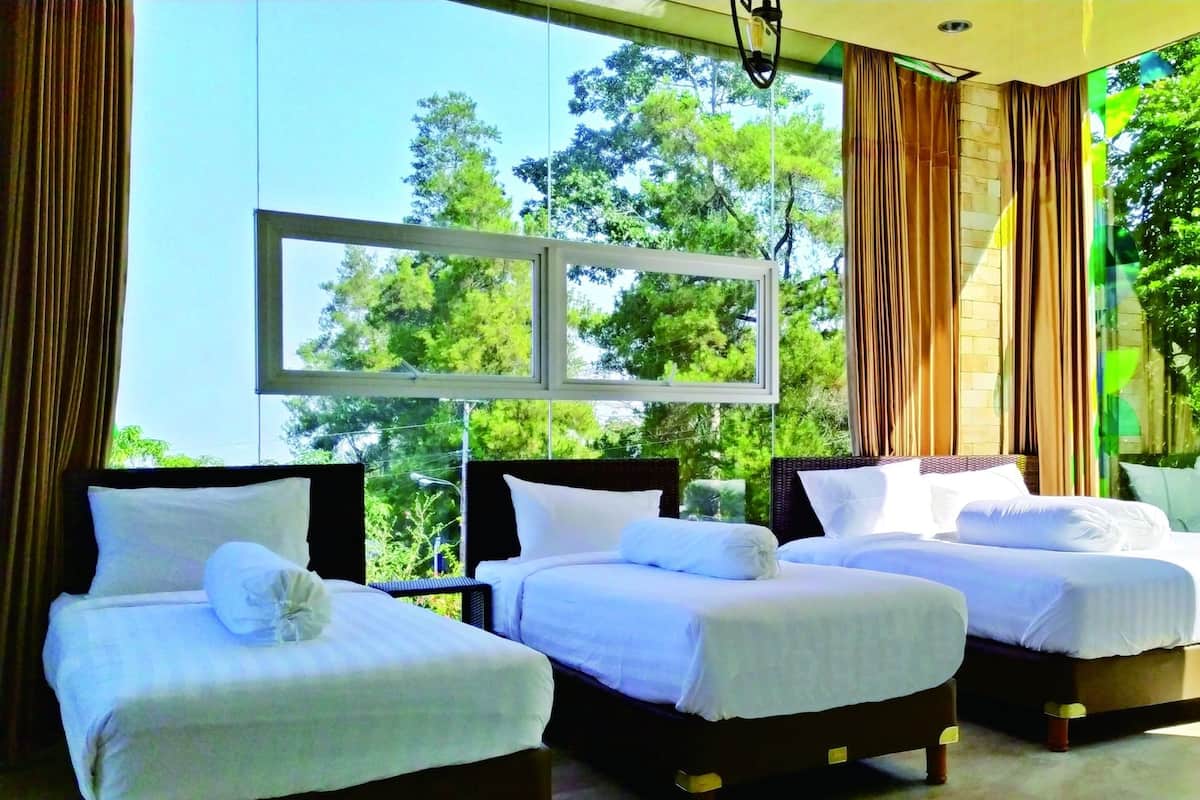 Habitación Deluxe | Camas supletorias, wifi gratis, ropa de cama