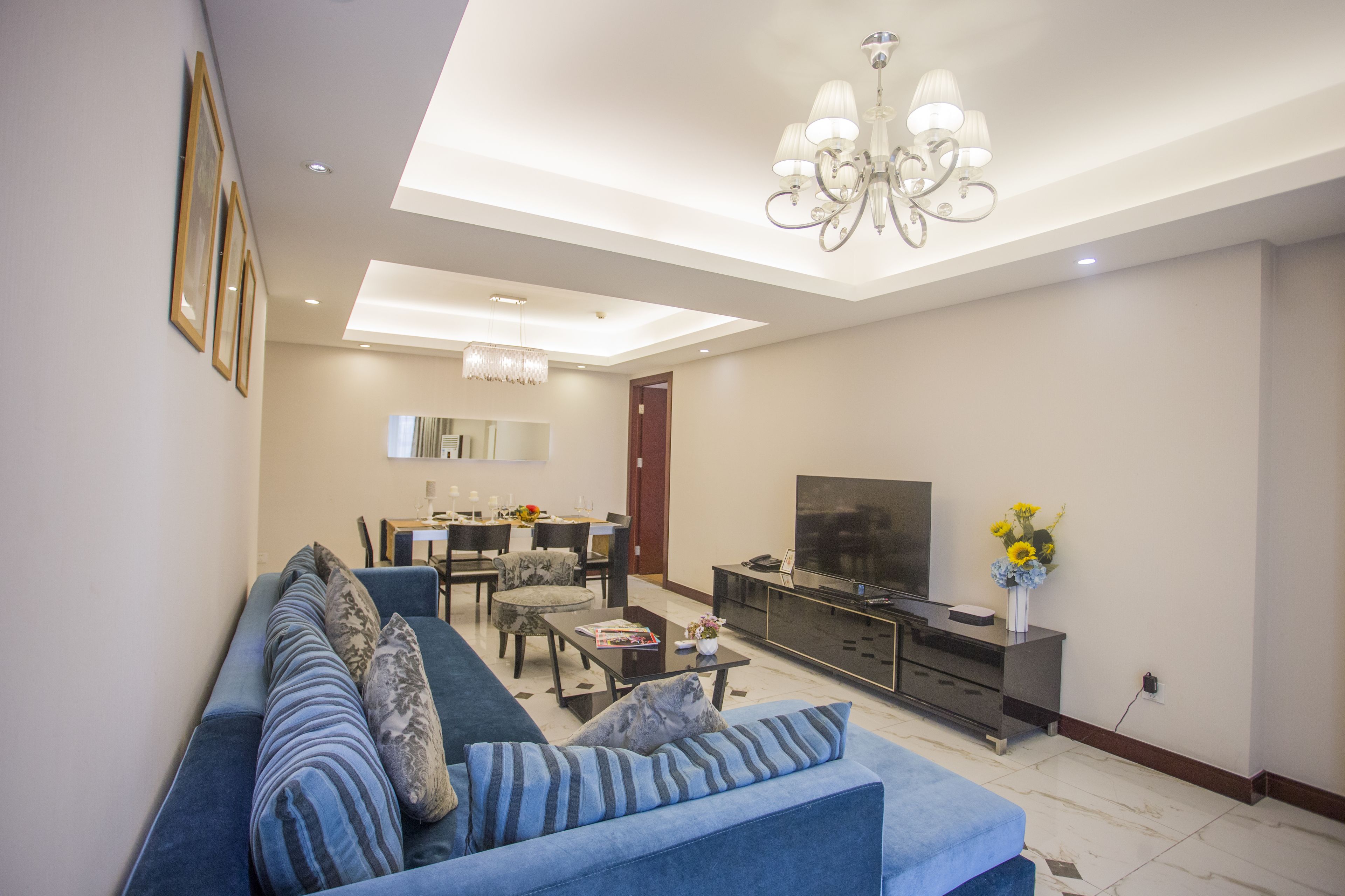 executive apartment, 3 bedrooms | living area | flat-screen tv