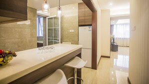 Executive Apartment, 1 Bedroom | Living area | Flat-screen TV