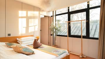 Elite Suite | Premium bedding, individually furnished, blackout drapes, free WiFi