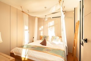 Elite Suite | Premium bedding, individually furnished, blackout drapes, free WiFi