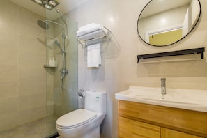 Shower, free toiletries, hair dryer, slippers