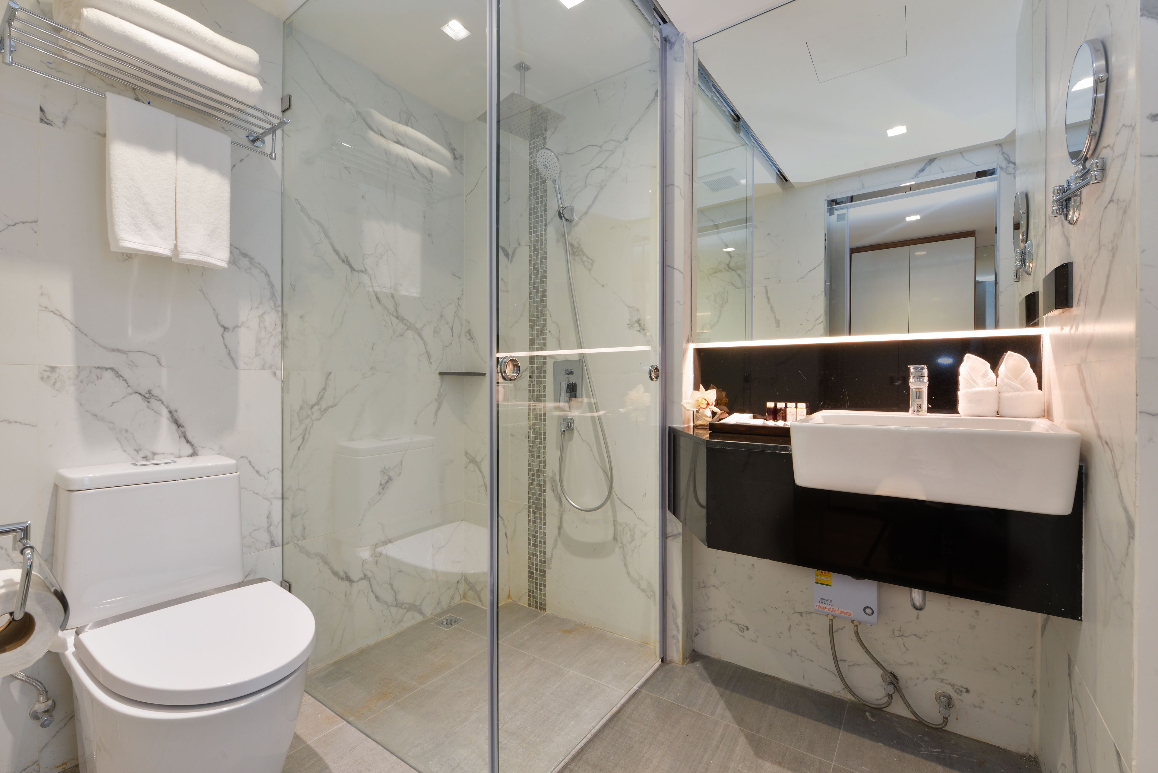 deluxe room  | bathroom | shower, rainfall showerhead, free toiletries, hair dryer