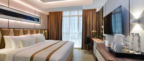 Deluxe Room | 迷你吧、客房内保险箱、办公桌、遮光窗帘