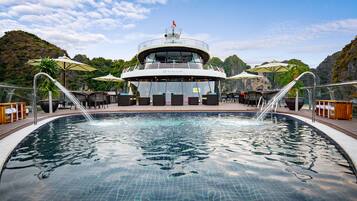 Outdoor pool, pool umbrellas, sun loungers