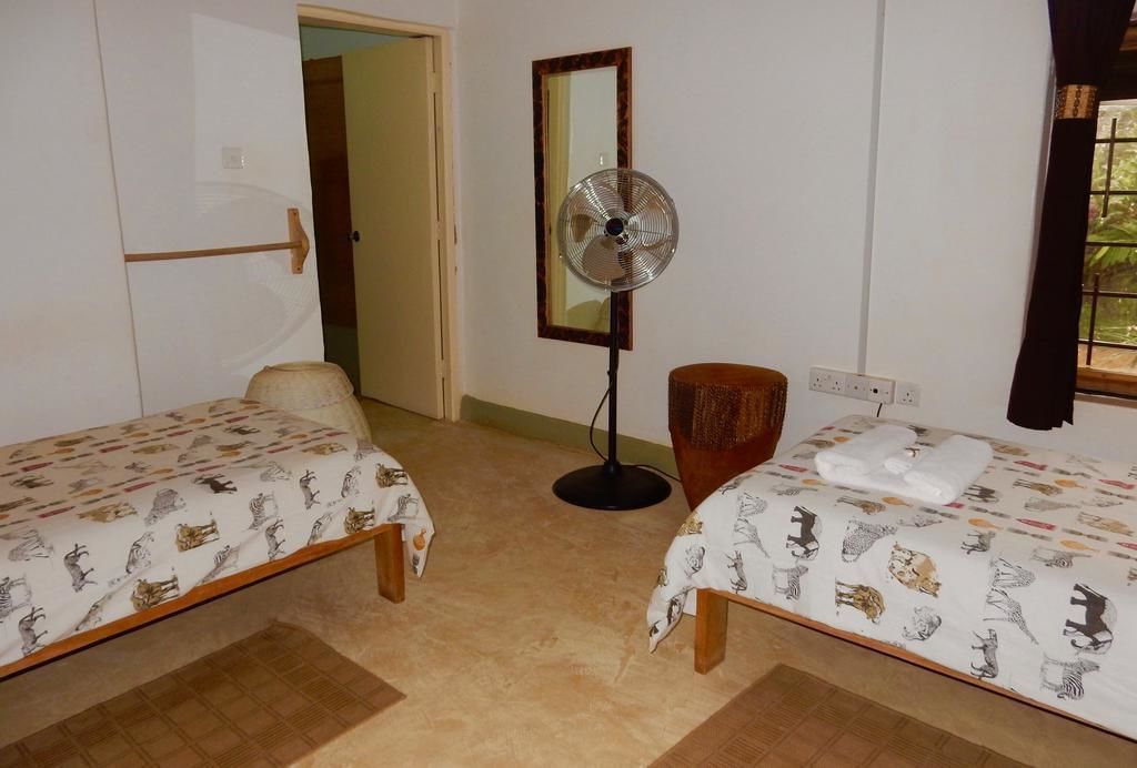 comfort room | 1 bedroom, in-room safe, desk