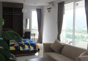 Studio Suite, 1 Queen Bed with Sofa bed | Living area | LCD TV - Studio At Mansion One (George Town)