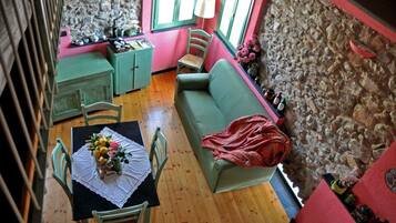 Apartment (Giada / Ametista) | Living area | Flat-screen TV