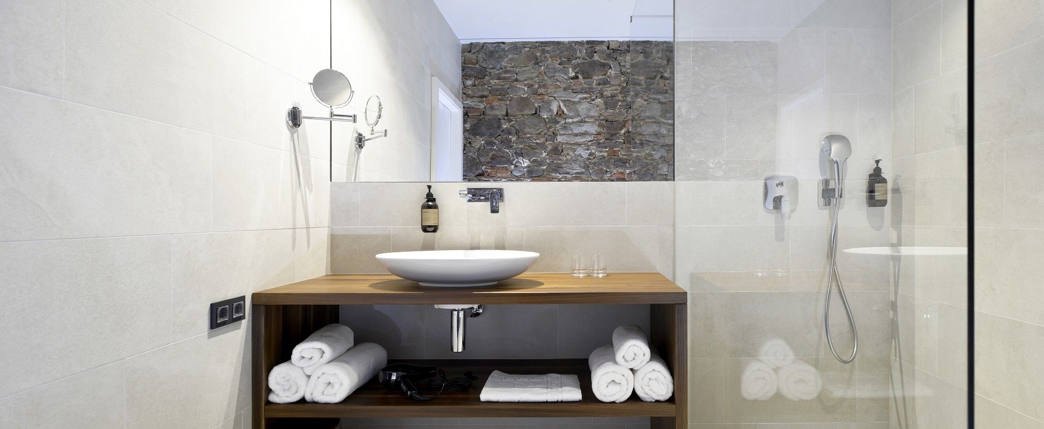 shower, rainfall showerhead, hair dryer, towels