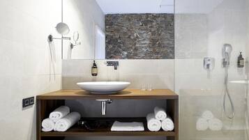Shower, rainfall showerhead, hair dryer, towels