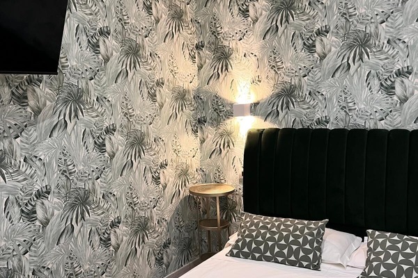 Camera quadrupla, balcone | Insonorizzazione, ferro/asse da stiro, Wi-Fi gratuito, lenzuola