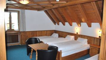 Standard Quadruple Room, 1 Bedroom | In-room safe, desk, blackout drapes, soundproofing