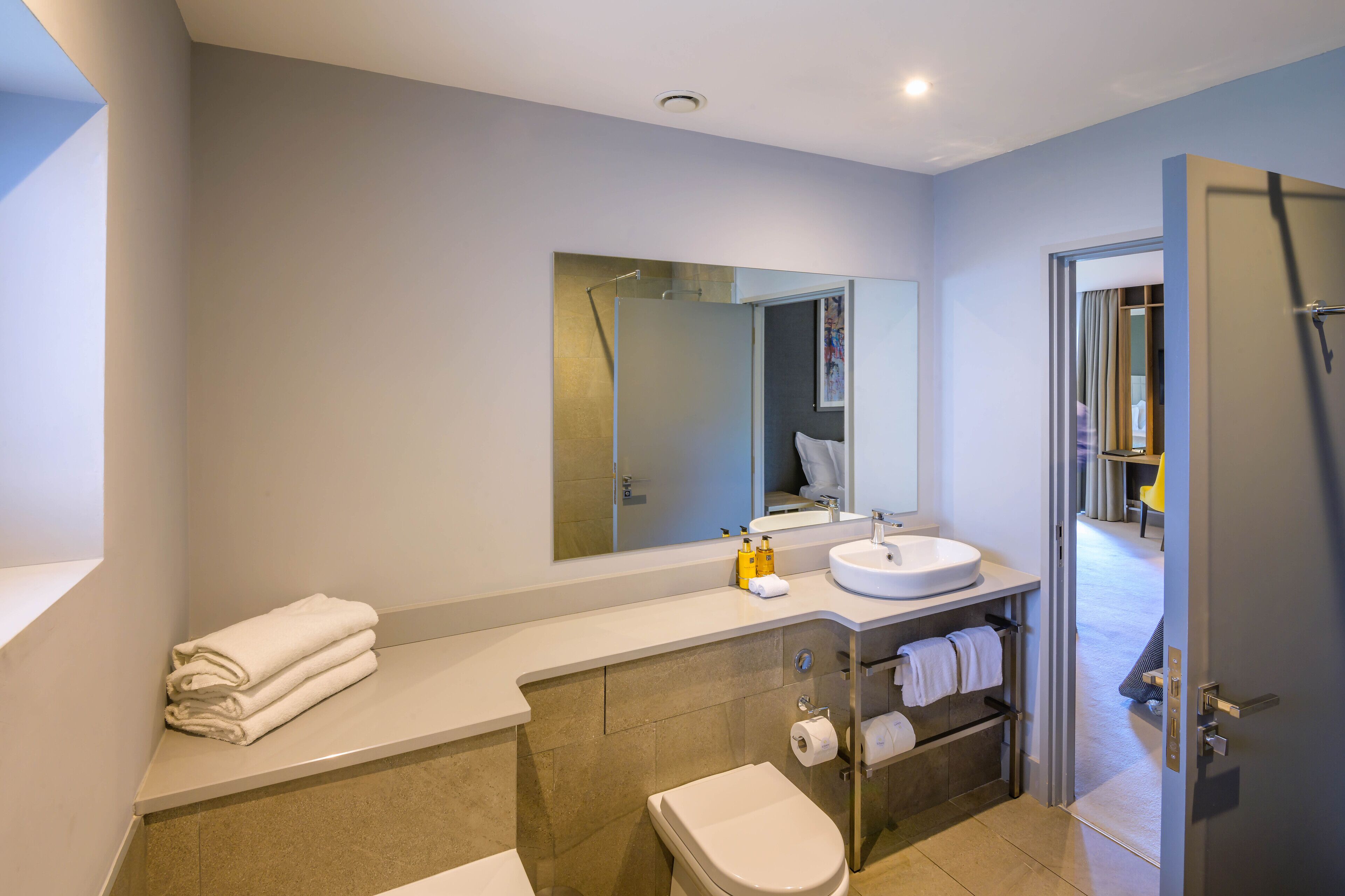 kennedy family room | bathroom | combined shower/bathtub, bathrobes, slippers, towels