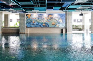 Outdoor pool, open 6:00 AM to 8:00 PM, lifeguards on site