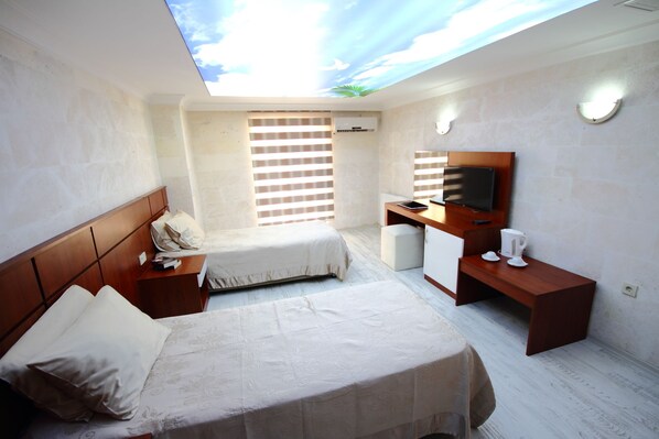 Desk, free WiFi, bed sheets