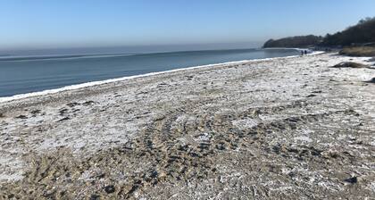 Bungalow close to the beach in a quiet forest settlement