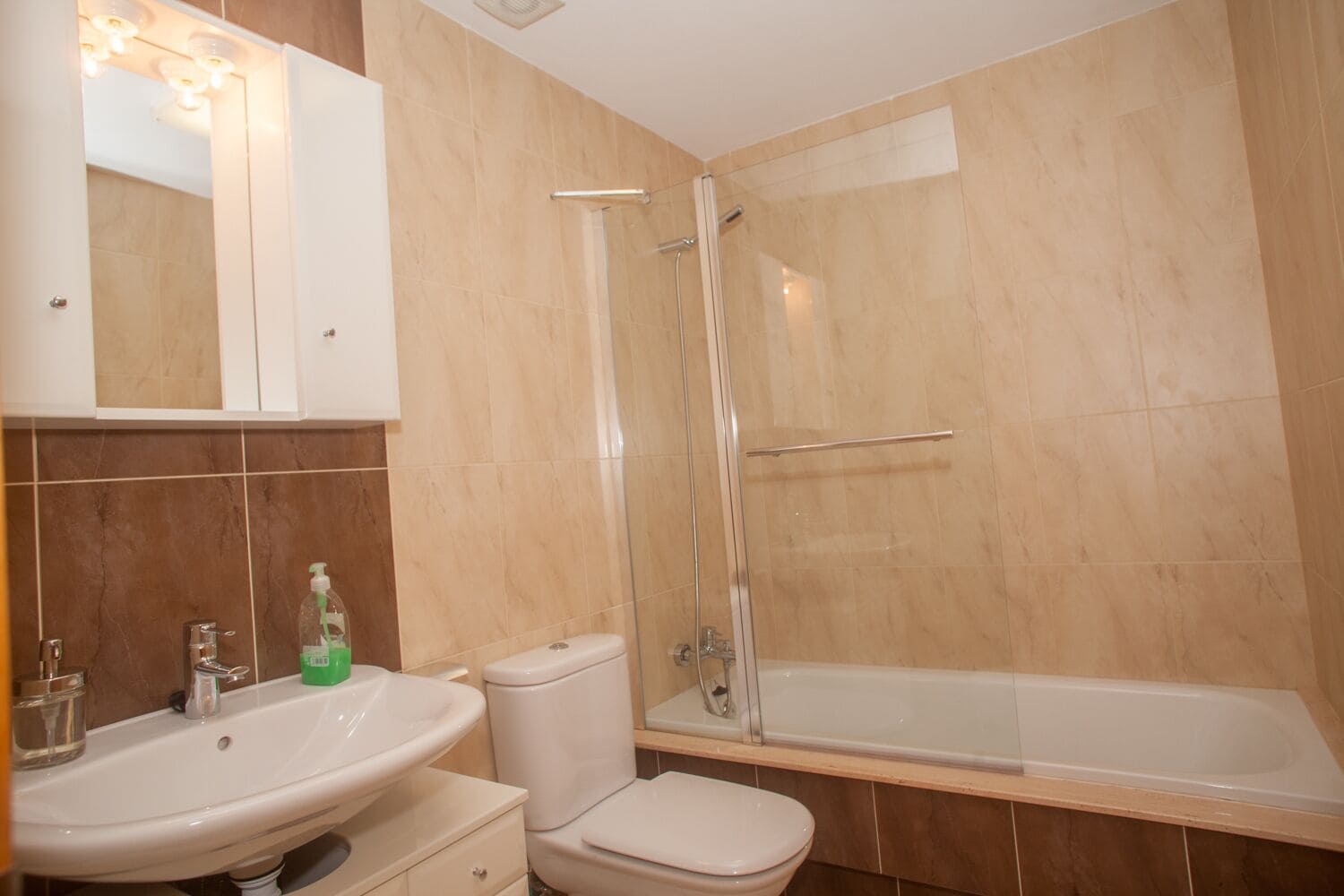 Shower, hair dryer, towels, toilet paper