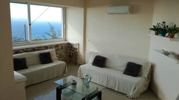 Apartemen Deluks, 3 kamar tidur, pemandangan laut | Area keluarga | TV dan pemutar DVD