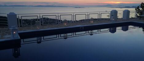 Outdoor pool, pool umbrellas, pool loungers