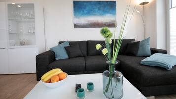 Apartment, 2 Bedrooms, Balcony (incl 90€ cleaning and 12€ service fee) | Living room | Flat-screen TV