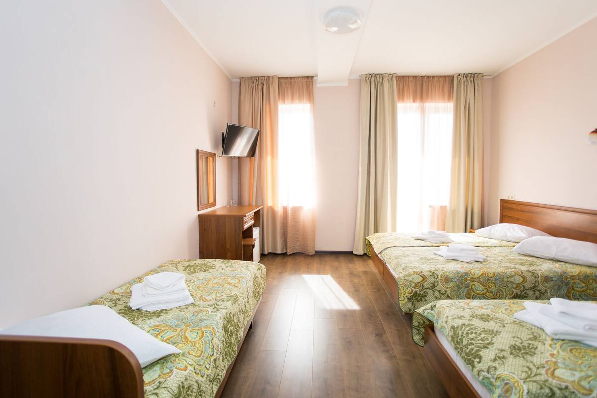 1 bedroom, desk, blackout curtains, iron/ironing board