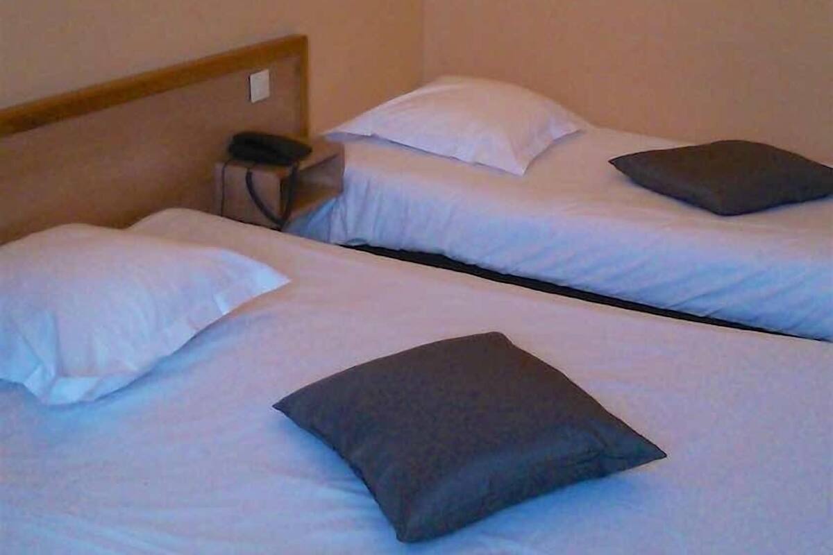 Blackout curtains, soundproofing, free WiFi, bed sheets