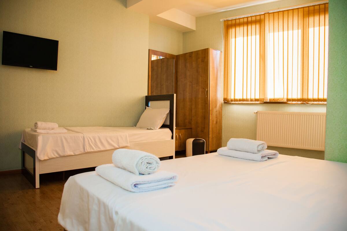 Family Triple Room, Multiple Beds, Non Smoking | Blackout drapes, WiFi (free), bed sheets