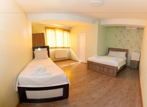 Family Triple Room, Multiple Beds, Non Smoking | Blackout drapes, free WiFi, bed sheets - Hotel Kavela (Tbilisi)