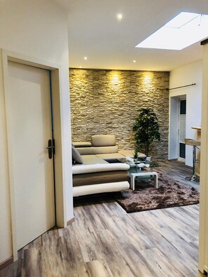 Appartement Familial | Coin séjour | TV connectée