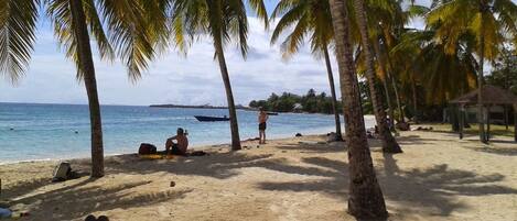 On the beach, sun loungers