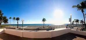 On the beach, sun loungers, beach towels