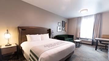 King Suite Roll-In Shower | Premium bedding, in-room safe, desk, iron/ironing board