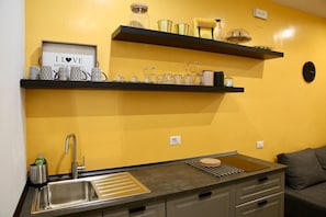 Suíte família, no piso térreo | Cozinha privada