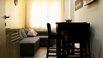 Suite familiare, al piano terra | Area soggiorno
