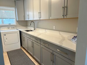 Fridge, microwave, coffee/tea maker, toaster