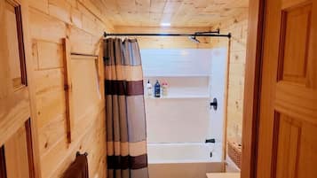 Combined shower/tub, hair dryer, towels, soap